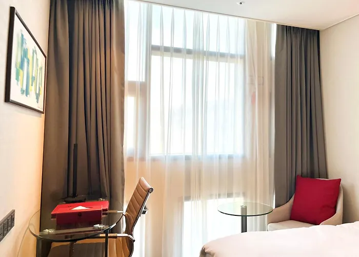 Hotel Ramada Encore By Wyndham Station 4*